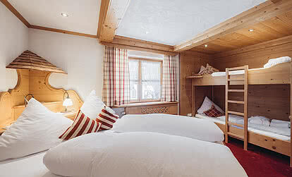 Four-bed room at Hotel Vermala