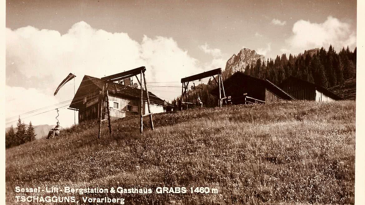Historische Ansicht vom Grabs im Montafon mit Bergstation, Liftanlage und alpiner Sommerlandschaft.